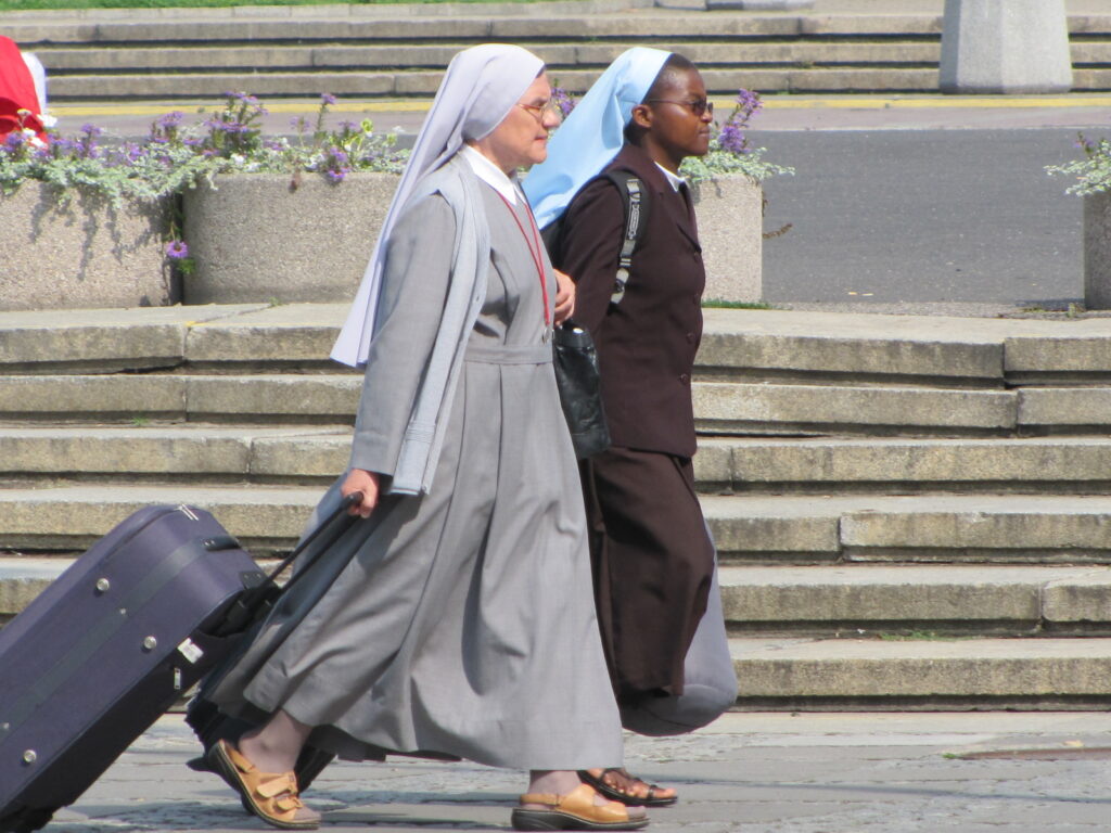 Nuns walking street scene Warsaw