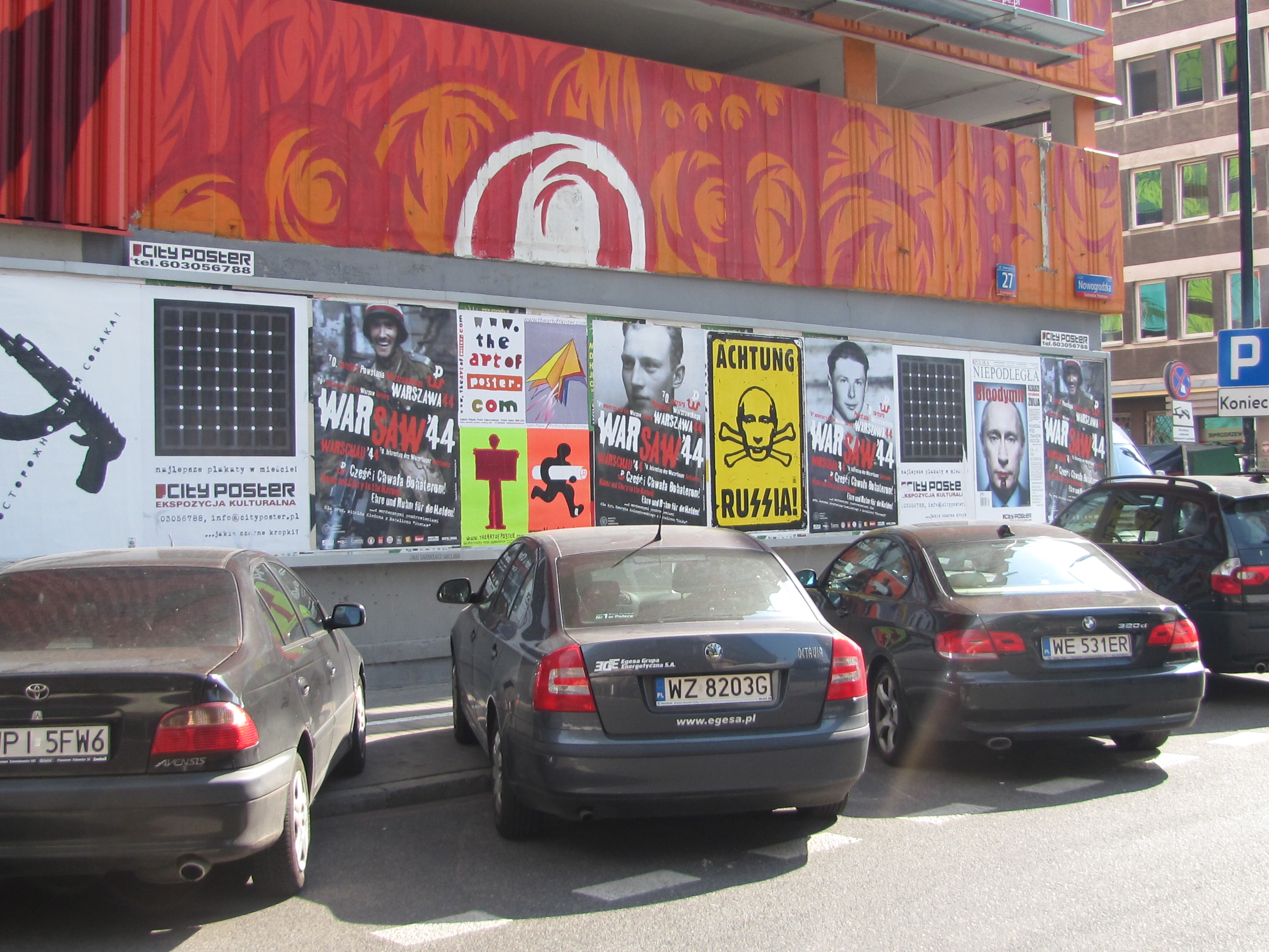 wall of posters warsaw poland
