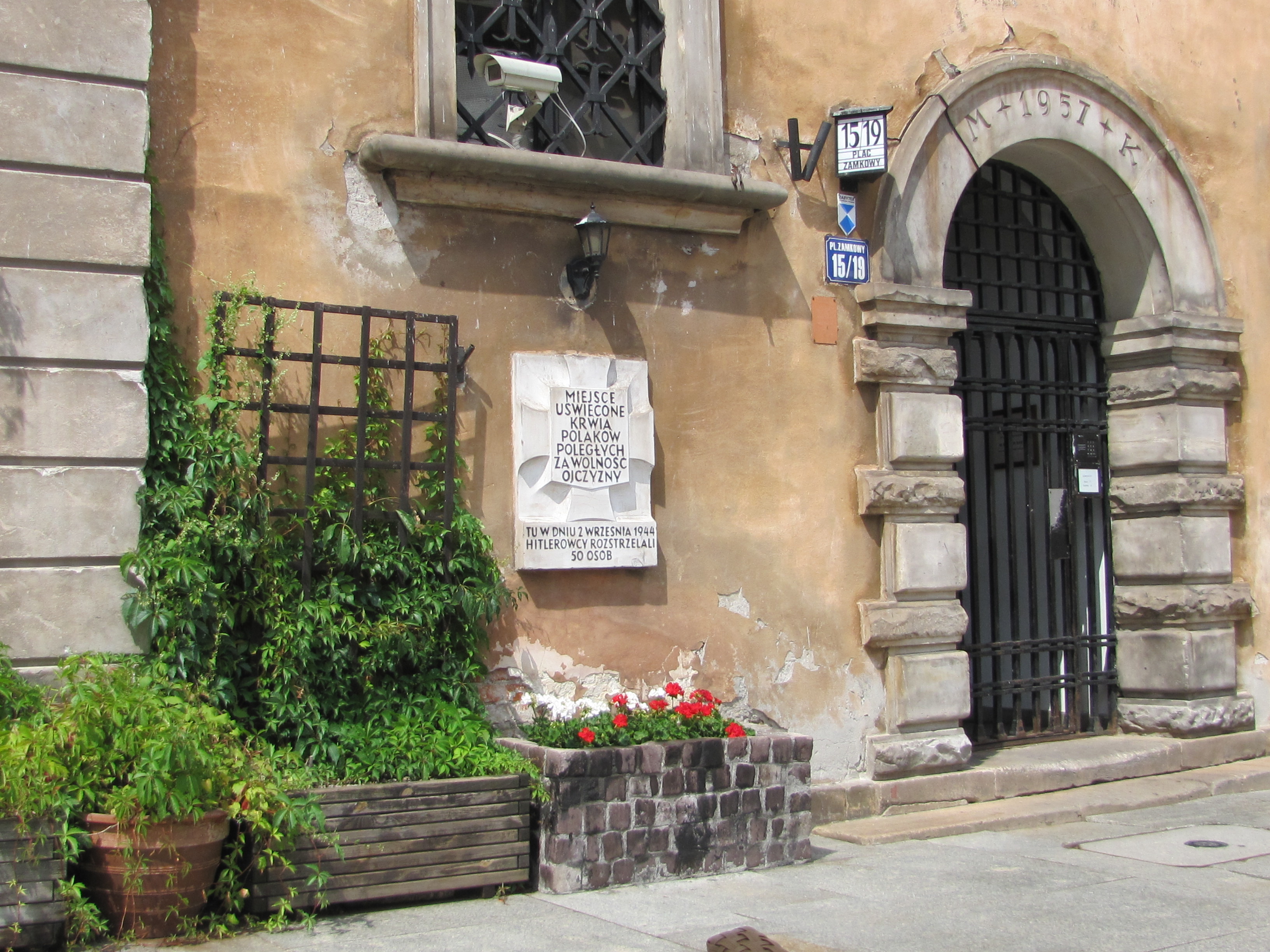 Plaque on wall Warsaw