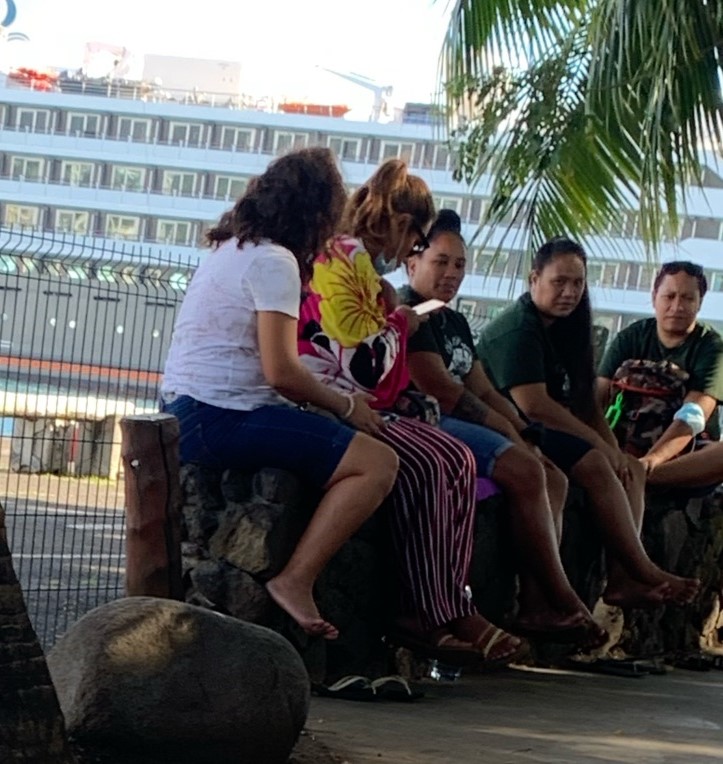 Ladies looking on in Tahiti