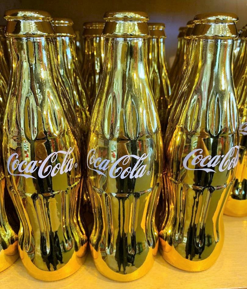 Gold coke bottles