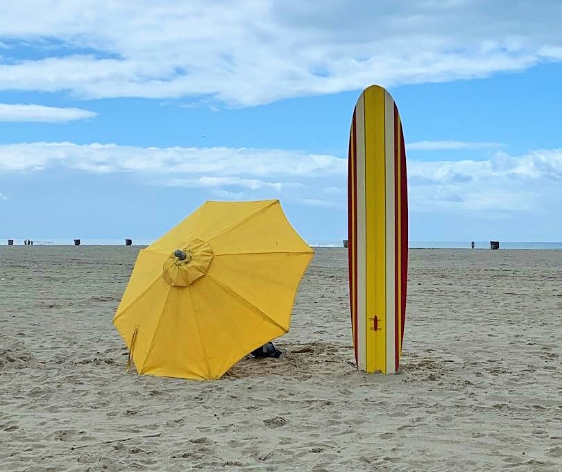 surfboard and umbrella