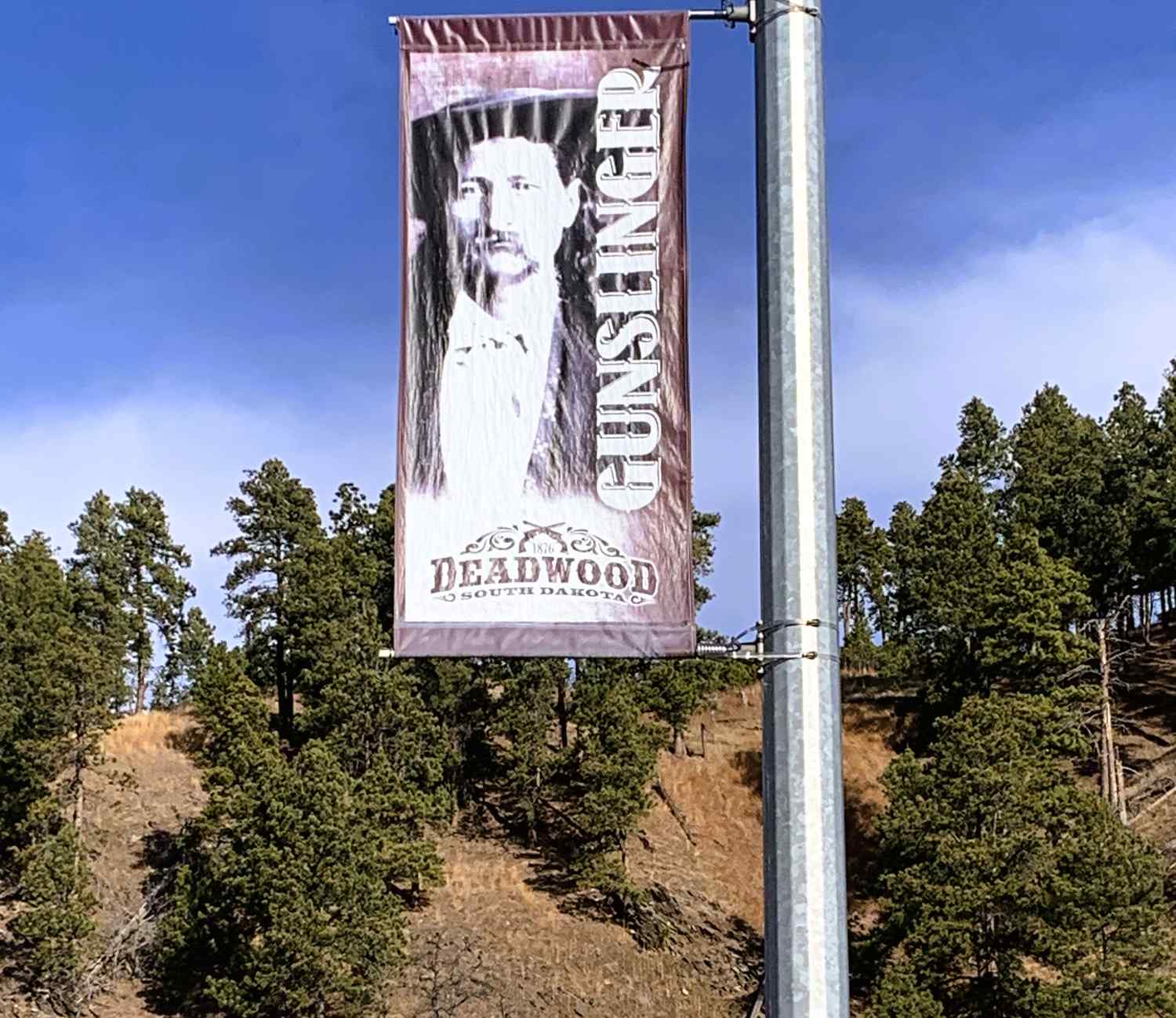 Deadwood gunslinger sign